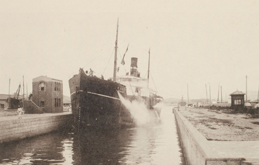 Large steamer passing through the lock gate