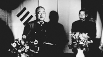 General Liu Qi, representing the Chinese government, giving a congratulatory address